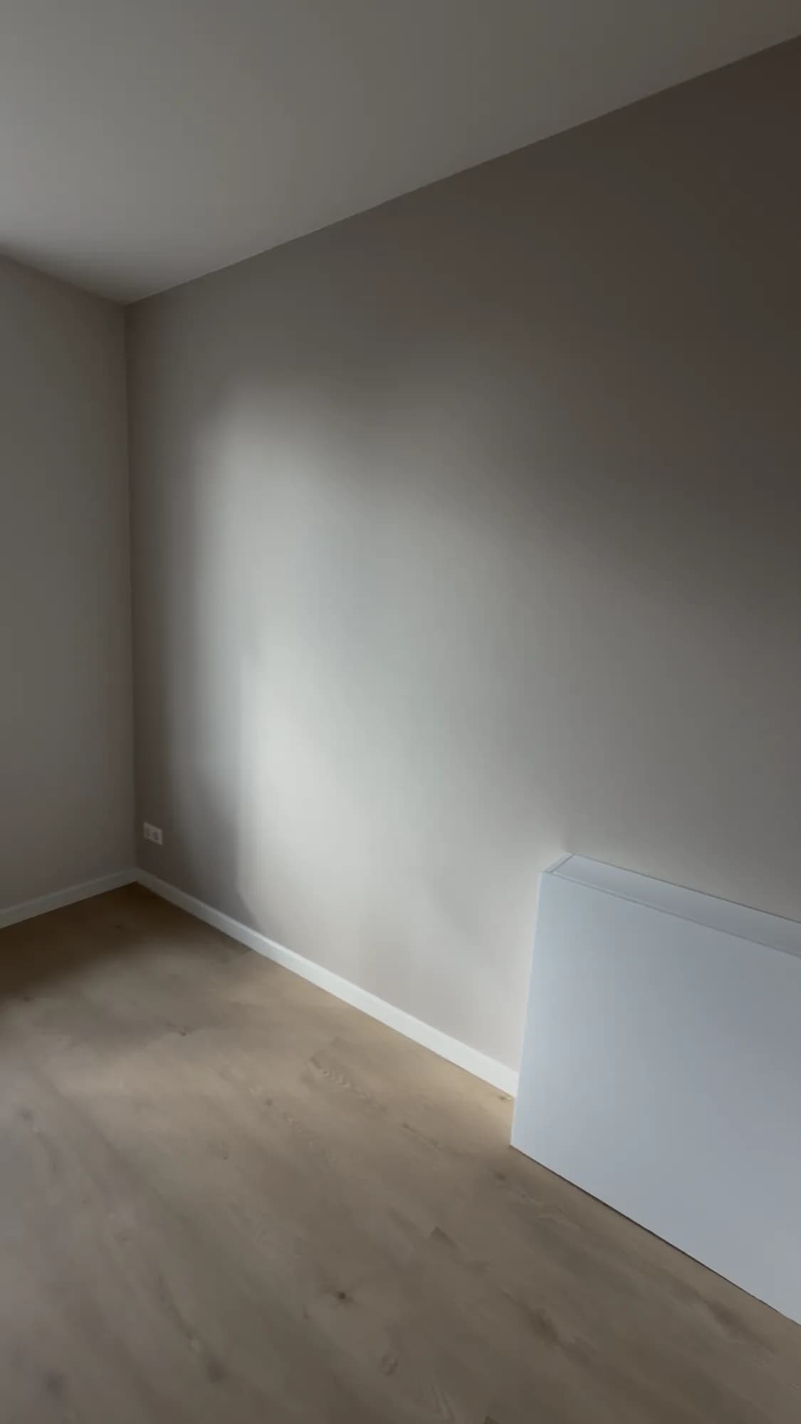 Room with new floor and smoothly finished walls