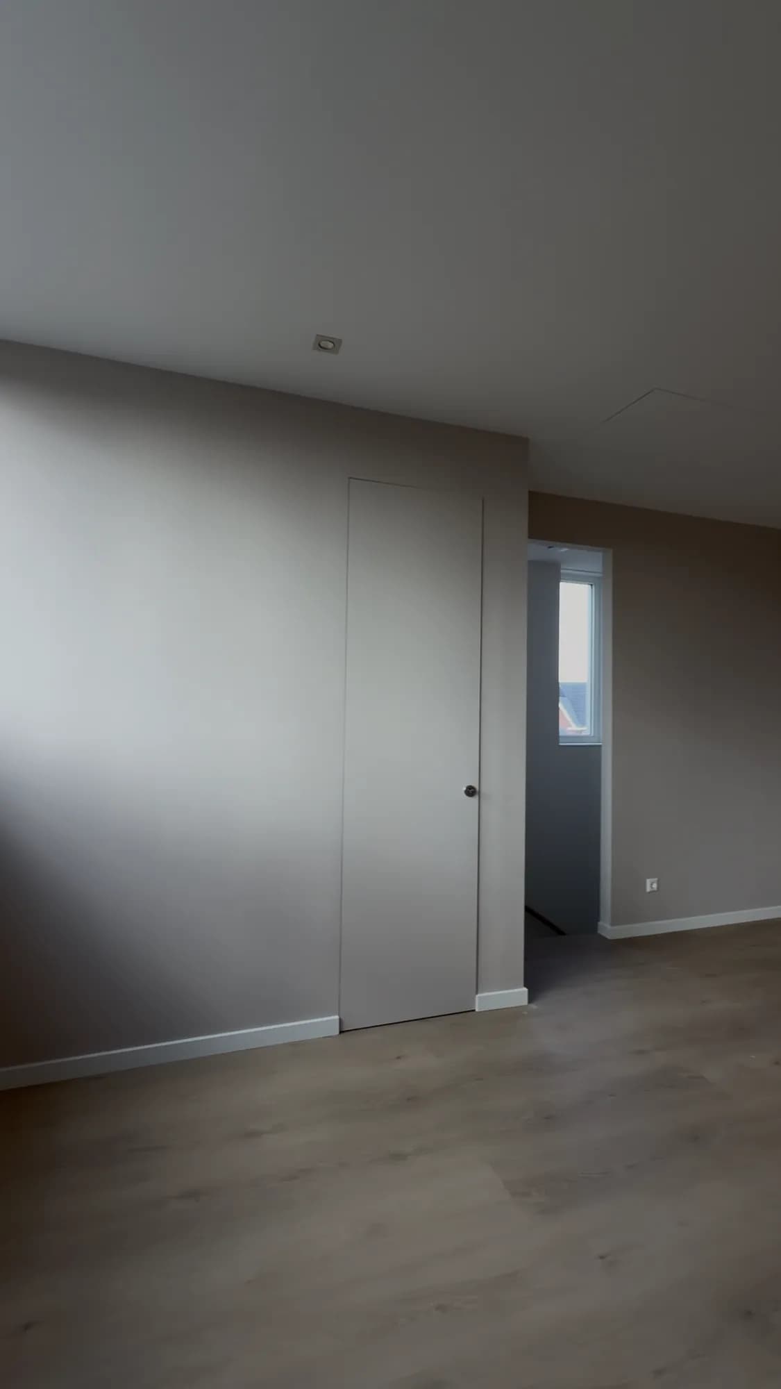 Bedroom with new laminate floor and neat skirting