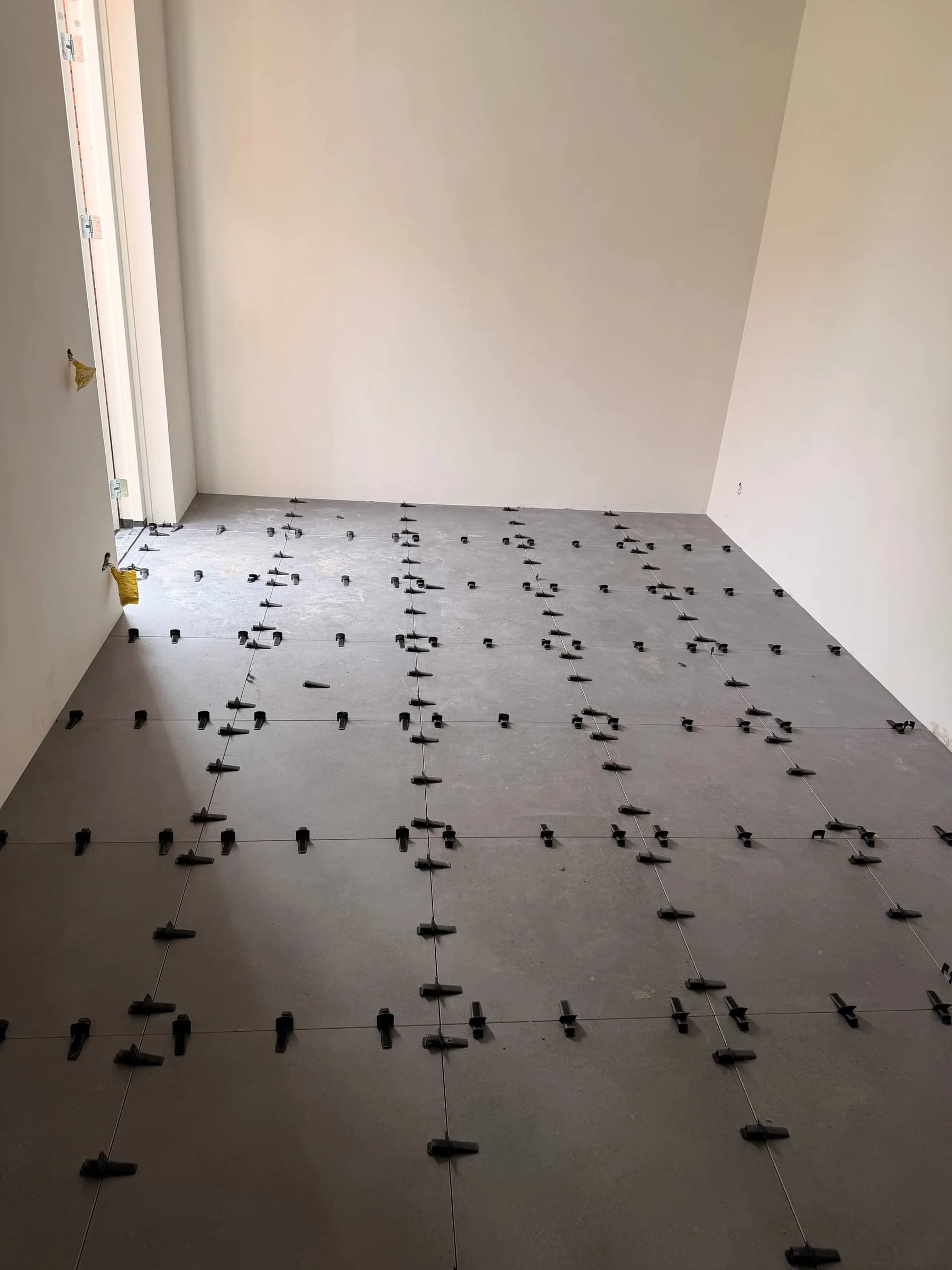Marble-look tiled floor in the hallway