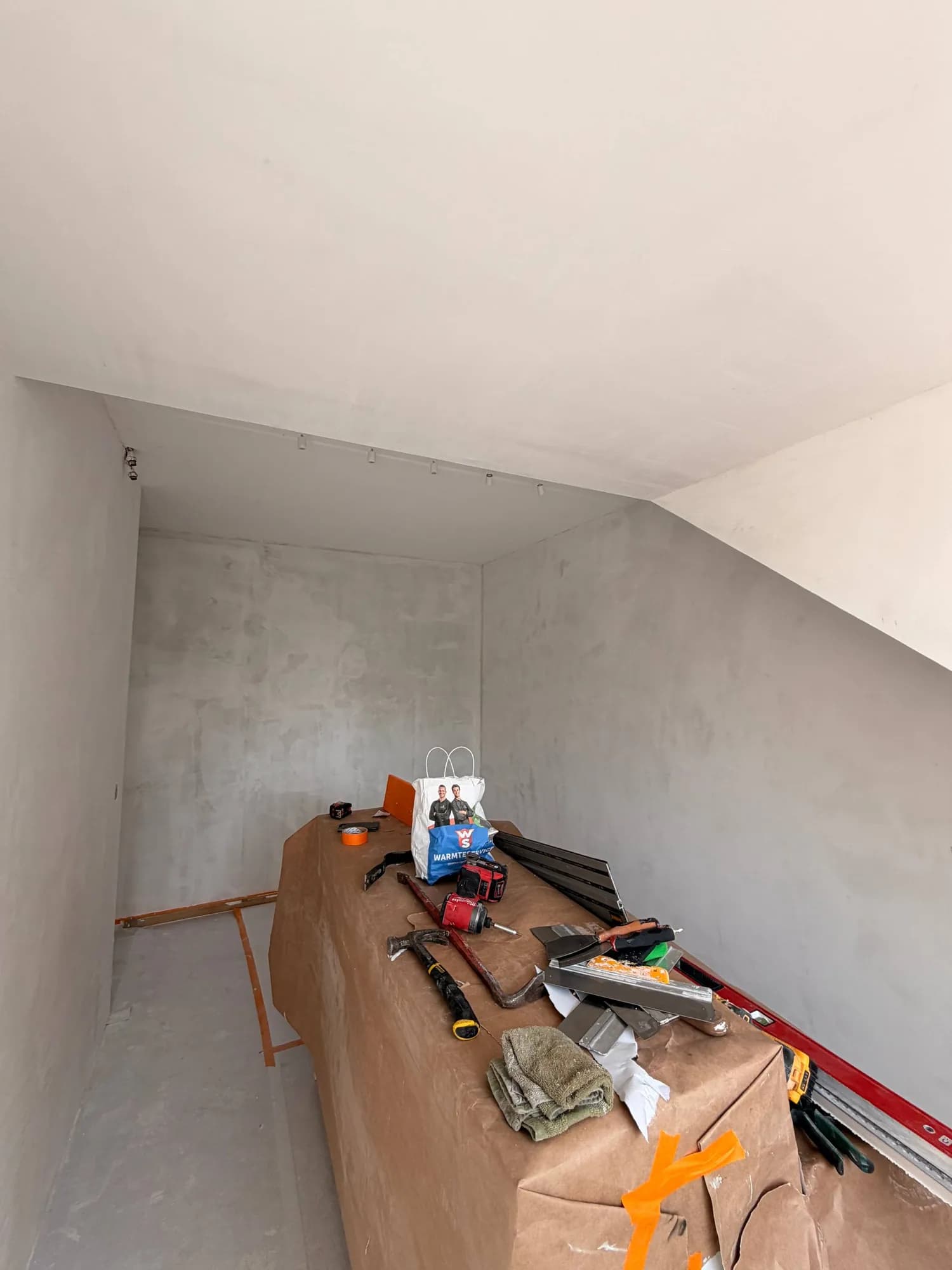 Plastering in progress in the attic