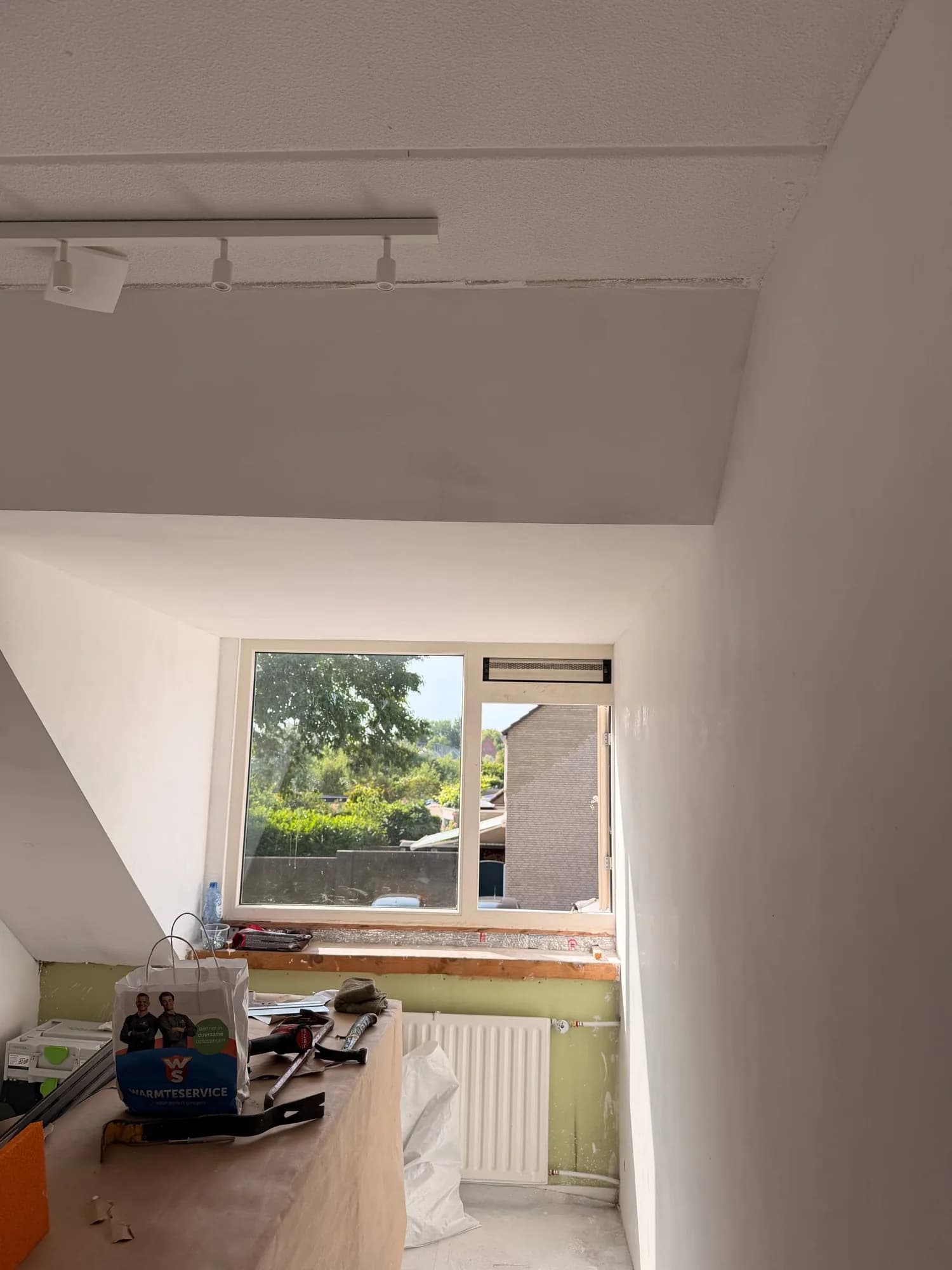 Plastered attic room with dormer
